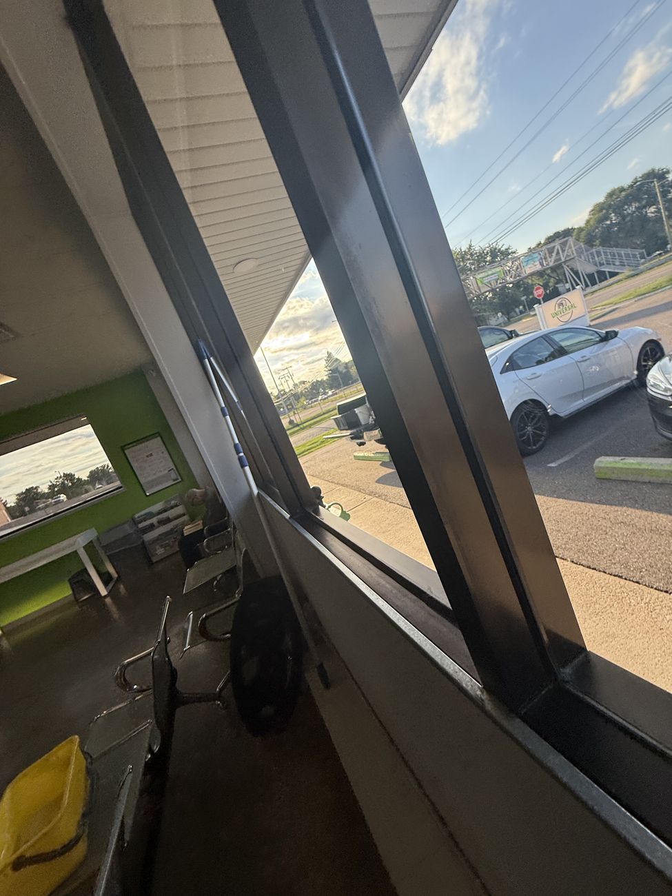 Streak-free interior glass inside the same Warren laundromat